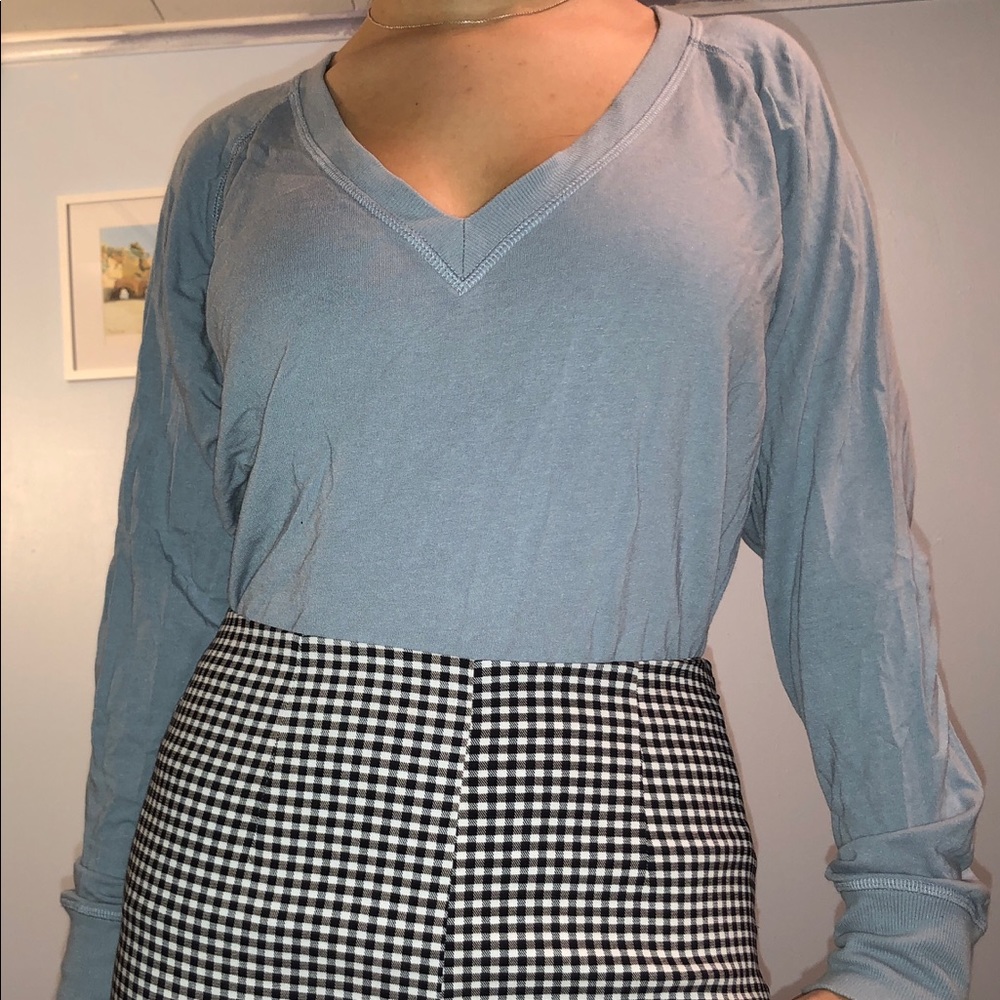 Blue long sleeve v neck sweater/shirt.